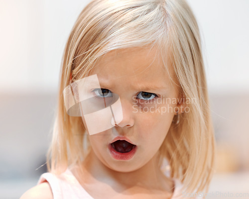 Image of Angry, little girl and tantrum face portrait reaction to shock of rejection and disappointment. Unhappy, frustrated and moody female child with bad attitude and annoyed eyes closeup in Canada.