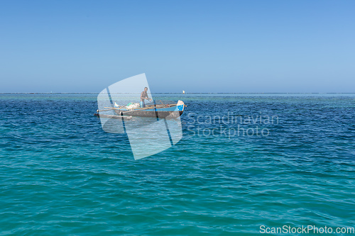 Image of Fishermen using sailboats to fish off the coast of Anakao in Madagascar