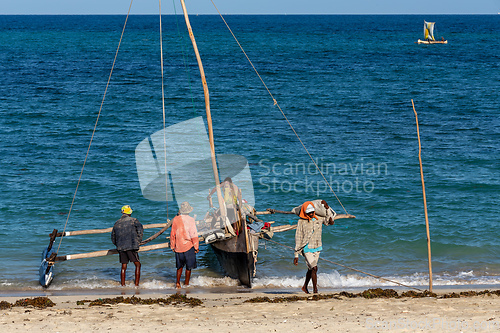 Image of Fishermen using sailboats to fish off the coast of Anakao in Madagascar