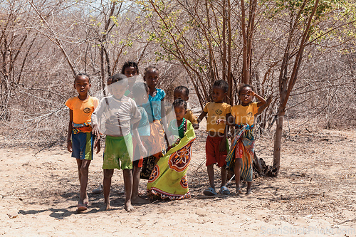 Image of Group of children standing in a line in front of Baobab Amoureux, Morondava, Madagascar
