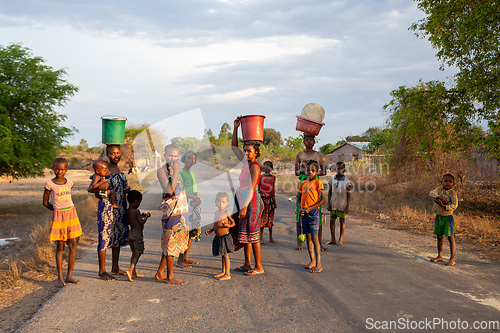 Image of Group of woman with container on head, a common sight in this rural Ethiopian village