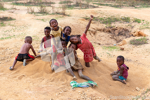 Image of Curious group of children looking at a tourist in Ilakaka. Madagascar