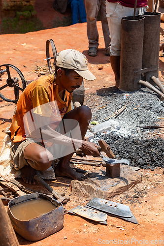 Image of Malagasy couple runs a blacksmithing business in Mandoto, Madagascar