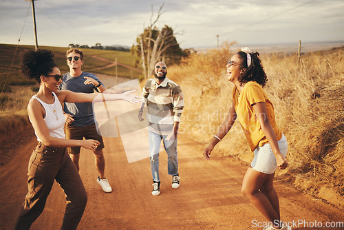 Image of Diversity, friends and dance outdoor on holiday, relax and fun enjoy a road trip together to celebrate vacation. Multiracial group and students outside on gravel path in summer, happy and dance