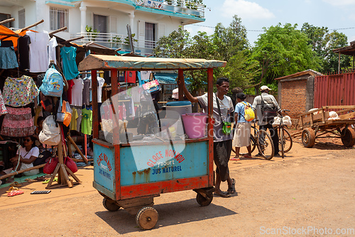 Image of Street market in Mandoto city, with vendors and ordinary people shopping and socializing. This image portrays the local lifestyle and economy of Madagascar.