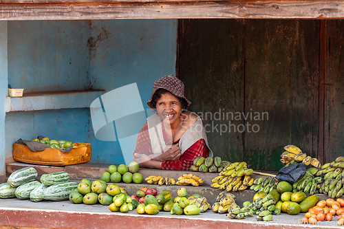 Image of Street market in Mandoto city, with vendors and ordinary people shopping and socializing. This image portrays the local lifestyle and economy of Madagascar.