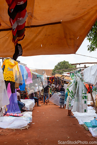 Image of Street market in Mandoto city, with vendors and ordinary people shopping and socializing. This image portrays the local lifestyle and economy of Madagascar.