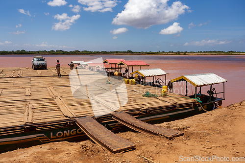 Image of Ferry carrying passengers travels on the Tsiribihina River in Madagascar.