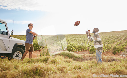 Image of Friends on a trip, travel and play football in nature on field in countryside. Fun, care free men playing together and relaxation on holiday break for bonding in serene landscape in summer.