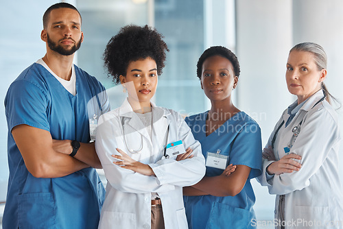 Image of Diversity, teamwork and portrait of medical doctors standing in the hallway of the hospital. Collaboration, medicine and team of multiracial professional healthcare employees at a medicare clinic.