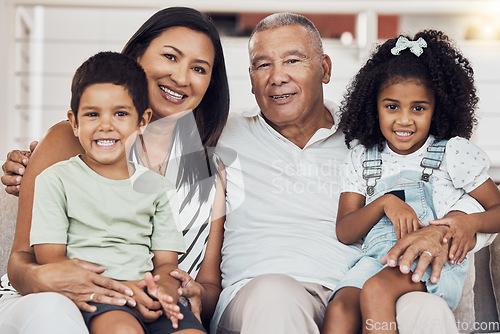 Image of Love, grandparents or children bond on sofa in house or home living room in trust, security or safety. Family portrait, happy smile or retirement senior elderly man and woman with Mexico boy and girl