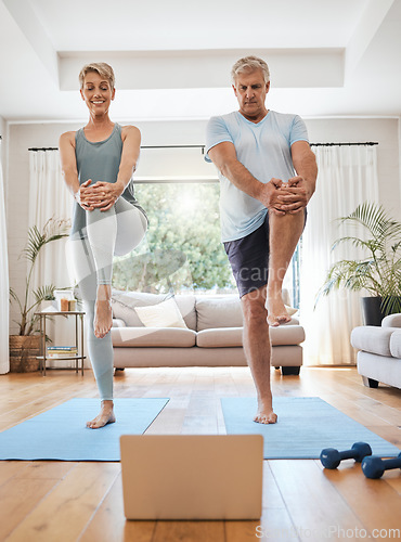 Image of Mature couple, laptop and home yoga tutorial in house living room for body stretching, relax fitness workout and exercise training. Happy smile, zen woman and senior man with laptop for pilates class