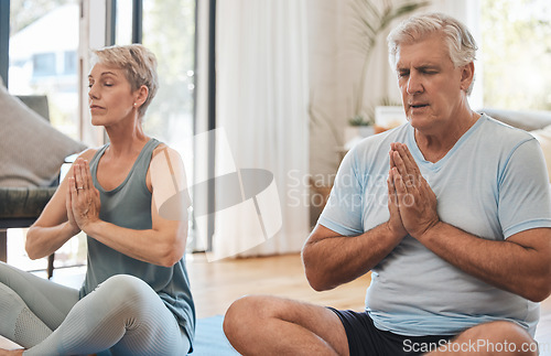 Image of Meditation, pilates and senior yoga couple work on stress relief, fitness or chakra energy training. Retirement, namaste, and elderly man and woman meditating for peace, wellness or spiritual freedom