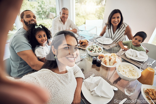 Image of Big family selfie while eating food or lunch together in their home dining room table with a portrait smile. Happy Puerto Rico parents, mother and father with children for digital holiday memory