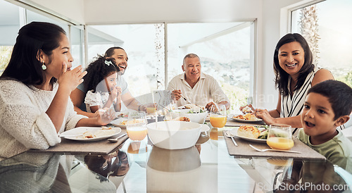 Image of Happy, food and big family morning breakfast at dining table in home talking, eating and bonding. Grandparents, parents and children relaxing while enjoying meal together with happiness, love and fun