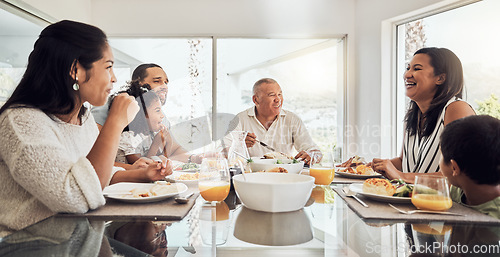 Image of Family, grandparents and children eating breakfast together in the morning. Love, parents and kids bond over a meal sitting at a table with food. Conversation, talking and happy family in their home