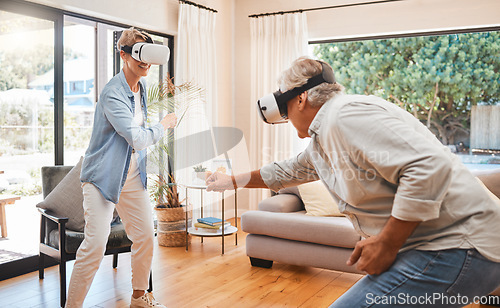 Image of VR, gaming and metaverse with a senior couple playing a video game in their home for fun together. 3d, virtual reality and internet with an elderly gamer and his wife enjoying an immersive experience