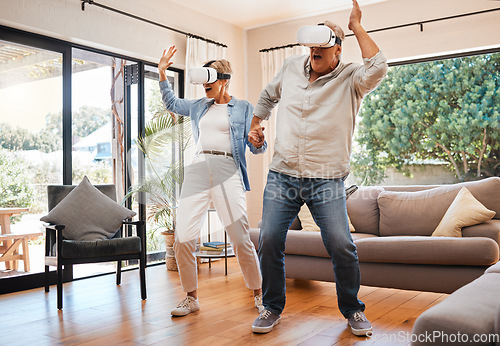 Image of Vr dance, 3d and senior couple with games for creative, futuristic and comic happiness in the living room of the house. Elderly man and woman playing metaverse and digital dancing on technology