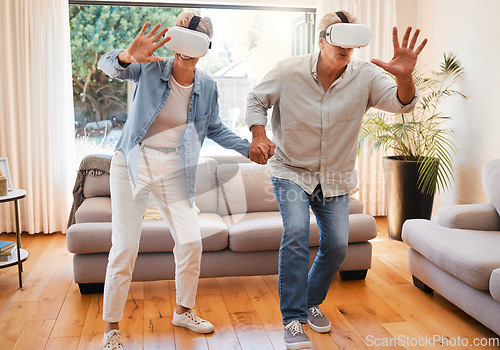 Image of Metaverse, vr headset and senior couple in fun 3d play game in lockdown house or home living room. Virtual reality, cyber esports and digital gaming for retirement elderly man and woman holding hands
