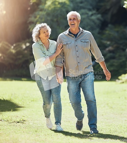 Image of Senior couple walking in park, garden and sunshine to relax, wellness and fresh air in nature in Australia together. Happy man, smile woman and elderly people holding hands, enjoy retirement and love