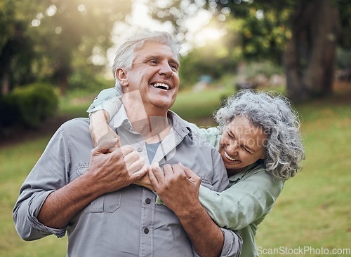 Image of Senior couple hugging in park, garden and retirement to relax, wellness and fresh air in nature in Australia together. Happy man, funny woman and playful elderly people laughing, enjoy joke and love