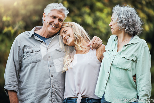 Image of Nature, senior parents and hug with daughter to bond on weekend in usa for happy family moment. Proud, elderly and retirement people with woman relatives smile together with care and love embrace.