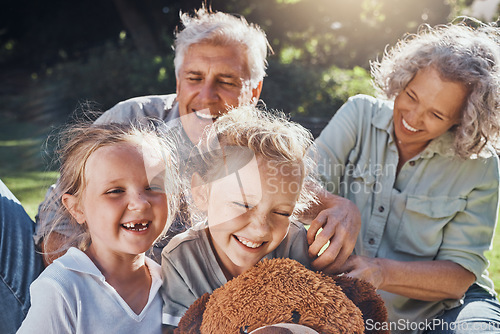 Image of Family, children and love with a girl, grandparents and sister outdoor in a nature park for fun and adventure. Kids, park and picnic with an elderly male, female and grandchildren laughing outside