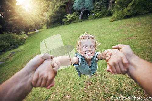 Image of Child spinning from hands in park, pov and happy summer evening. Fun time, motion and girl in garden swinging from arms, support from dad in nature. Kids, grass and swing from hand in field in Sweden