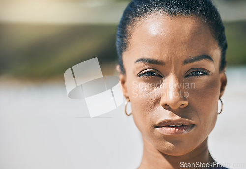 Image of Beauty, face and empowerment with a free black woman outdoor for freedom and human rights. Skin, portrait and proud with a young empowered female standing outside for justice, hope and activism