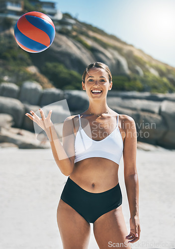 Image of Volleyball portrait, beach sports and woman with smile during game at the ocean with ball on holiday in Mexico. Happy girl playing in sport match in a bikini by the sea during vacation in summer