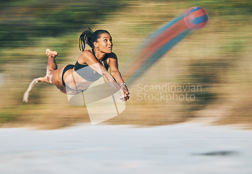 Image of Volleyball, beach sports and fast woman in bikini while on holiday travel in Miami during summer. Jump, cardio and strong girl playing in sport competition by the ocean on vacation for fitness