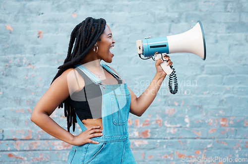 Image of Megaphone, protest and black woman with speech, rally and announcement for politics, equality and human rights. Feminist, revolution and loud communication with voice shouting for justice and freedom