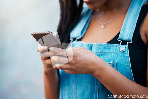 Image of Gen z black woman hands, social media and city phone typing, contact and communication on smartphone internet technology in Jamaica city. Closeup urban girl mobile apps, connect to 5g website online