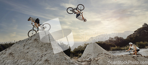 Image of Bmx cyclist, fitness or stunt jump air performance on Australian track or nature park trail in cycling exercise or training. Extreme sports, danger risk or mountain bike man in energy freedom workout