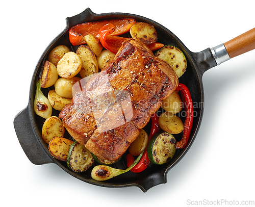 Image of whole roast pork and vegetables