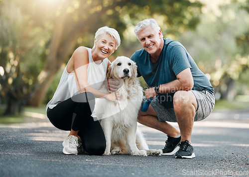 Image of Happy senior couple, walking dog in nature park and smile bonding with their golden retriever together. Healthy living in retirement, being physically active by exercising and relaxing time with pet
