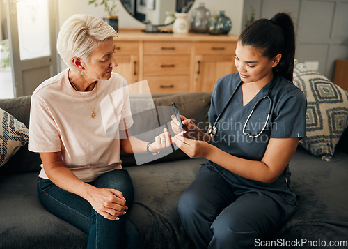 Image of Diabetes, healthcare nurse and elderly woman finger doing blood test, sugar or medical test with a glucometer. Insurance doctor, health or diabetic senior lady consulting her glucose wellness at home