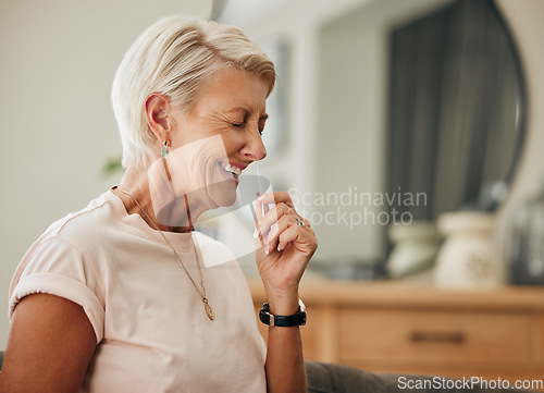 Image of Covid, antigen rapid test and woman with nose swab for health, illness, or virus PCR results of senior with at home. Elderly lady, coronavirus and laughing using nasal stick for possible infection