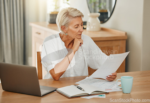 Image of Senior woman, debt and laptop bills payment for loan budget and retirement finance paperwork at home. Retired Ukraine elderly person reading pension, loan and mortgage savings financial bank report