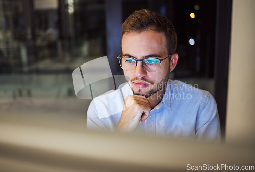 Image of Businessman, computer and office thinking at night planning trading strategy for financial market at finance company. Canada online trader person focus, working or reading pc corporate fintech email