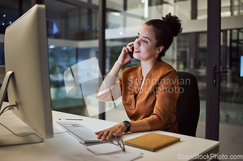 Image of Phone call, communication and networking with a business woman working on a computer in her office late at night. Research, report and deadline with a female employee at her work desk for overtime