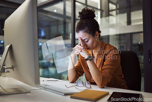 Image of Headache, business woman at night and computer stress while working for a deadline with pc glitch. Sad corporate manager with anxiety about target working at desk screen late to complete task online