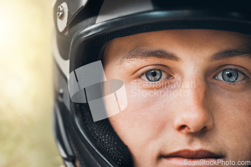 Image of Training, cycling and face with a man in a helmet for adventure, fitness or exercise outdoor and closeup. Safety, sports and workout with a male athlete out on a ride for health, cardio and wellness
