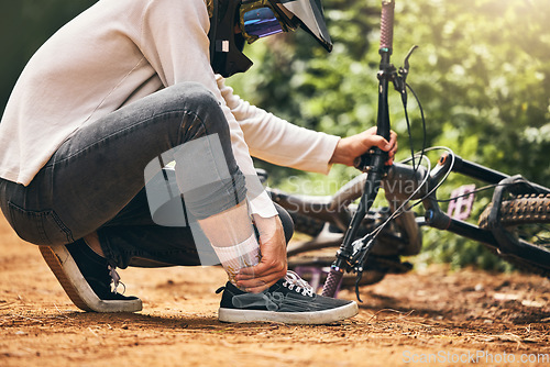 Image of Man, ankle pain and abstract injury in dirtbike sports for wellness exercise, training and health workout in Norway forest. Fitness stress, burnout and medical emergency or leg accident for cyclist