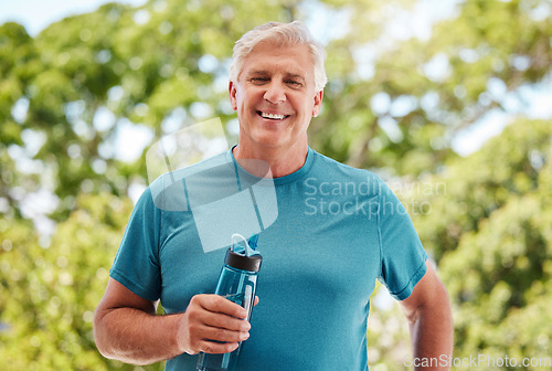 Image of Fitness, garden and a senior man with water bottle, exercise and hydrate in retirement. Health, nature and workout, a happy elderly guy from Canada with smile standing in outdoor park on a summer day