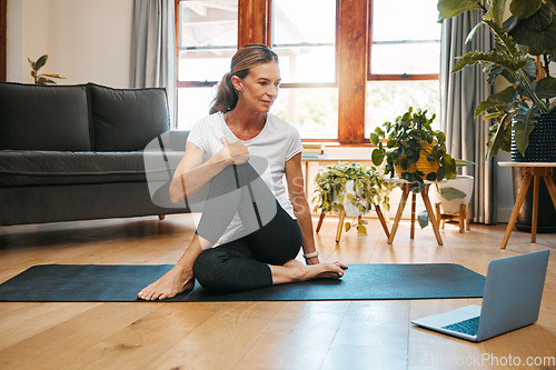 Image of Fitness yoga, laptop and senior woman in video call class for workout, wellness motivation and pilates exercise in home living room. Healthy person in cardio with pc technology for support tutorial