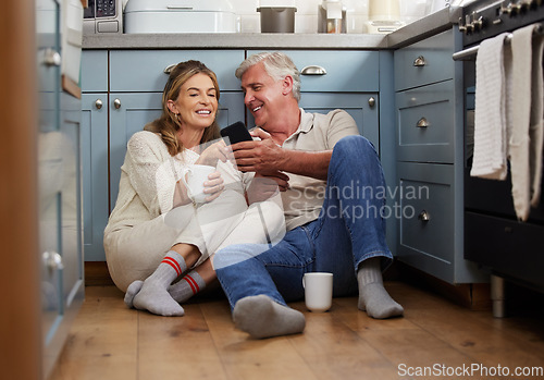 Image of Senior couple, phone or bonding with morning coffee on house or home hotel kitchen floor in trust, love or security. Smile, happy or technology for retirement elderly man and woman with internet news