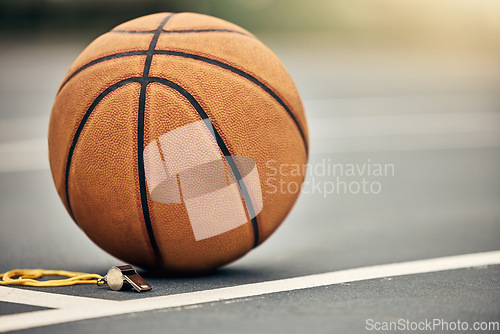 Image of Basketball, sport and whistle with a ball on a court outside for fitness, exercise or sports training. Workout, health and game with no one at an empty venue for cardio and health lifestyle