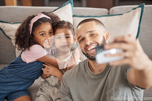 Image of Happy, smile and family selfie of a father and children relax on living room sofa while bonding, having fun and enjoy quality time together. Love, peace and happiness for dad and kids from Brazil