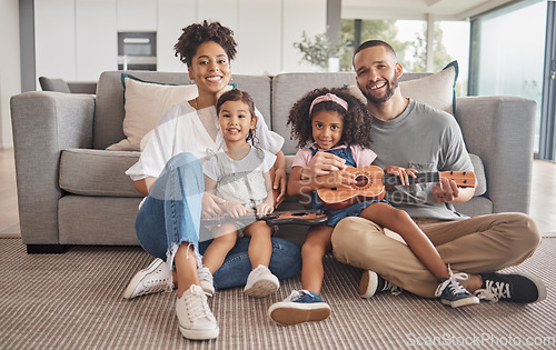 Image of Family, children and music learning guitar, in home living room and fun together. Black family, teaching and instrument with girl kids on floor of lounge in house with ukulele, love and education